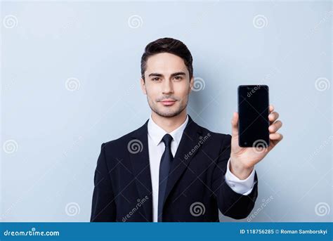 Handsome Young Guy Finance Broker With Stubble Is Holding Phone Stock