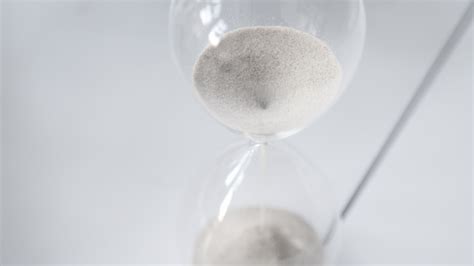 Hourglass Sand Falling Slow Motion Above Stock Footage Video 100 Royalty Free 1048090000