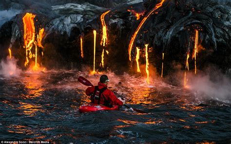 Daredevil Kayaker S Oar Catches Fire As He Explores Coastline Beneath