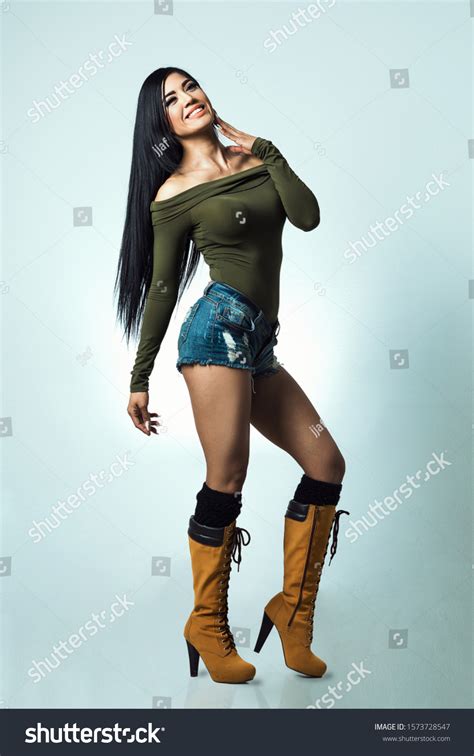 Sexy Latina Light Blue Background Foto De Stock Shutterstock