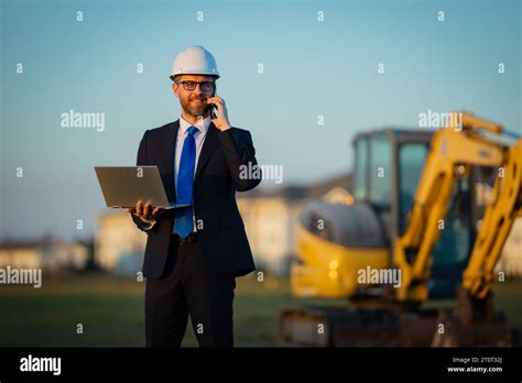 Civil Engineer Worker At A Construction Site Mature Engineer Worker