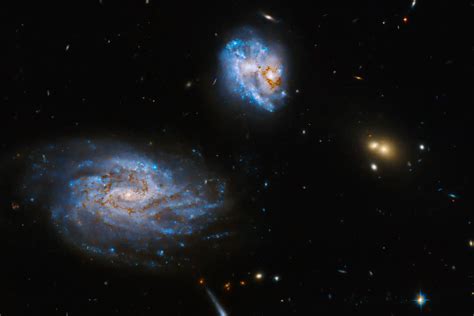 Hubble Captures Stunning Images Of Galaxies In Collision A Celestial