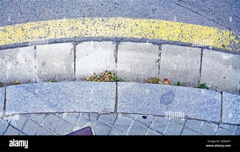 Sidewalk with curb for backgrounds and textures Stock Photo - Alamy