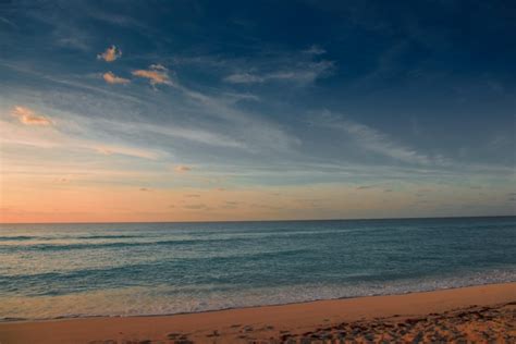 Premium Photo Dawn On The Caribbean Sea Clear Sky With Small Clouds