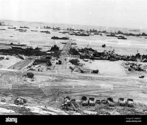 Ships Of Many Classes Lie Beached And Grounded At The Normandy