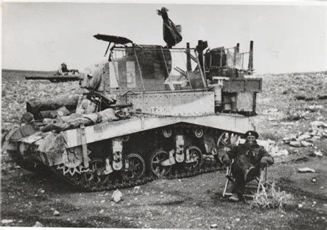 Sergeant Jack W Reeves In Front Of A M3 Stuart Honey Tank In Tunisia