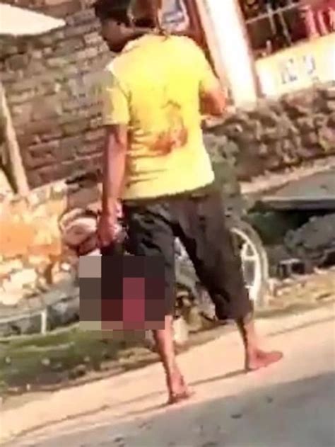 Uttar Pradesh Husband Carries Wifes Severed Head Down Street In