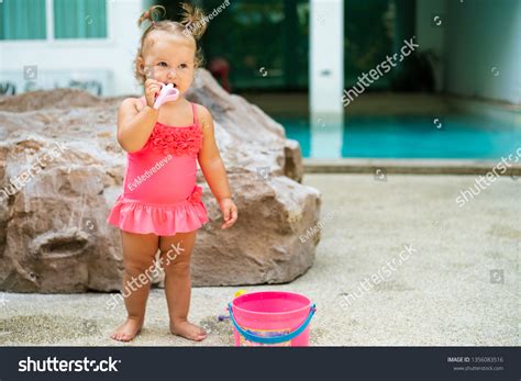 ภาพ ภาพสตอก วตถ มตและเวกเตอรเกยวกบ Little girl showing her bikini รายการ
