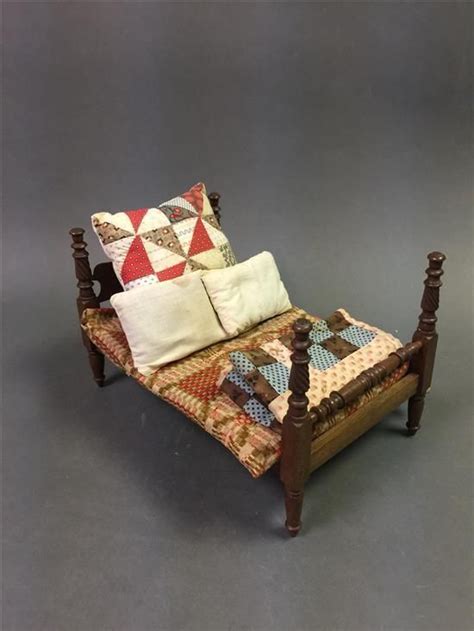 Sold Price Antique Doll Bed With Quilts And Pillows Measures 14