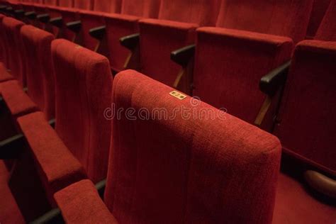 Red theater chairs stock photo. Image of indoor, show - 99886802