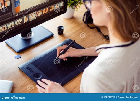 Back View Of Graphic Designer Working With Interactive Pen Display