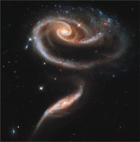 A rose is a...galaxy collision: Hubble sends the people of Earth a ...