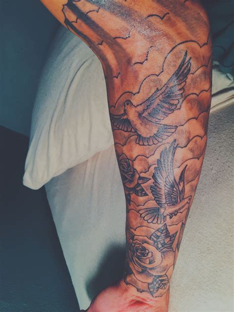 Dove Tattoo Designs With Clouds