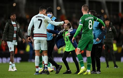 Football News Cristiano Ronaldos Class Act To Pitch Invader Goes