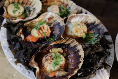 Grilled Scallops With Lemon And Hazelnut Butter And Yuzu Mayo Dip With Crab Claws And Crudités