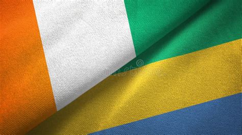 Cote D Ivoire And Gabon Two Flags Textile Cloth Fabric Texture Stock