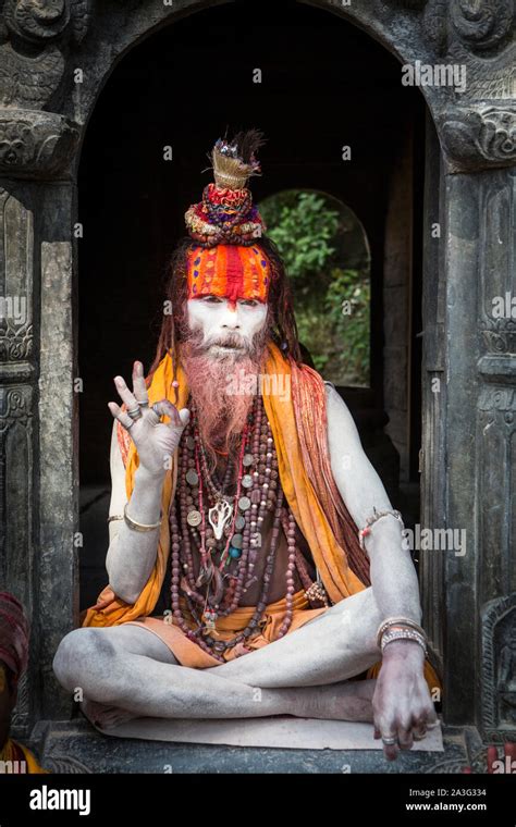 A sadhu, a Hindu holy man, at Pashupatinath Temple in Kathmandu, Nepal ...