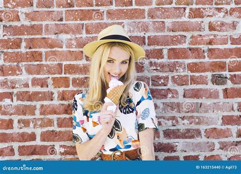 Woman Licks An Ice Cream Cone In A Seductive Way Stock Photo Image Of