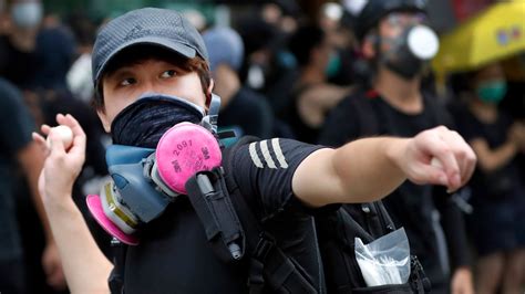 Hong Kong Protesters Hurl Objects At Police Station Ctv News