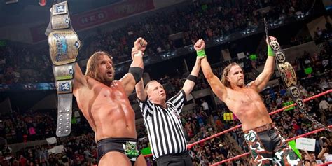 10 Pairs Of Wwe World Champions Who Won Tag Team Titles Together