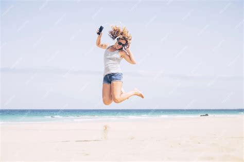 Premium Photo Cheerful And Attractive Caucasian Young Woman Enjoy The