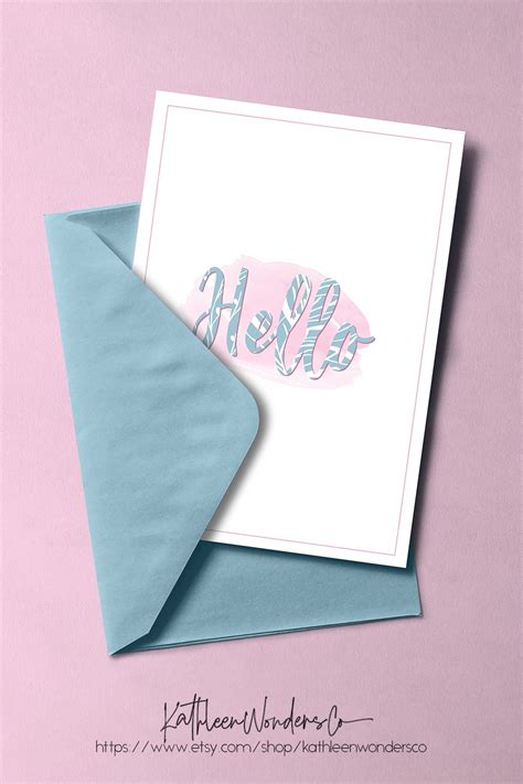 Image Of A Greeting Card In An Envelope With Stylized Hello Text