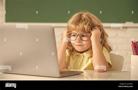 Knowledge Day Concept Of Online Education Nerd Kid In Glasses With