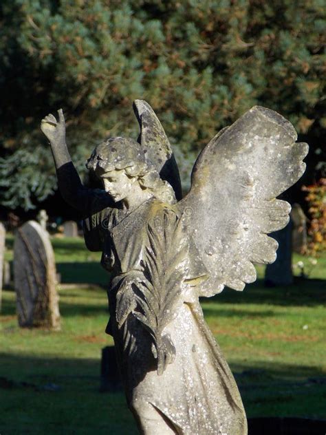 Angel Sculpture Stone Masonry In An English Graveyard Stock Image