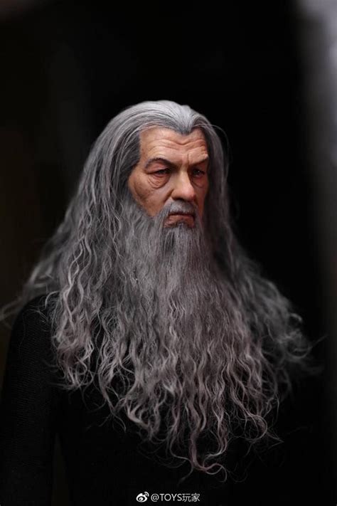 An Old Man With Long Grey Hair And Beard