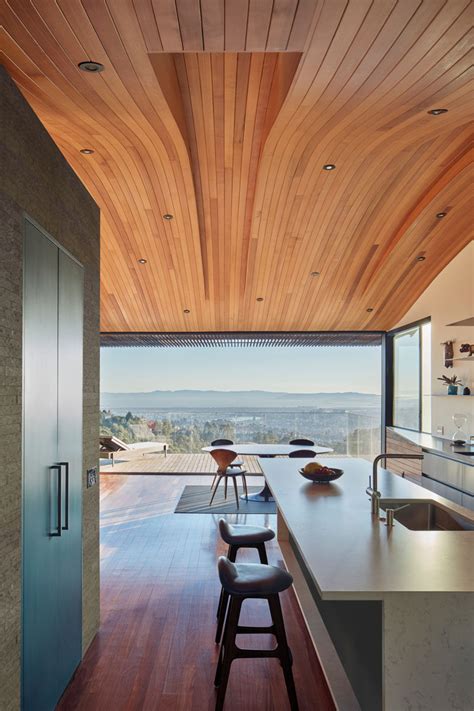 The Ceiling In This Modern House Echoes The Shape Of The Hillside It