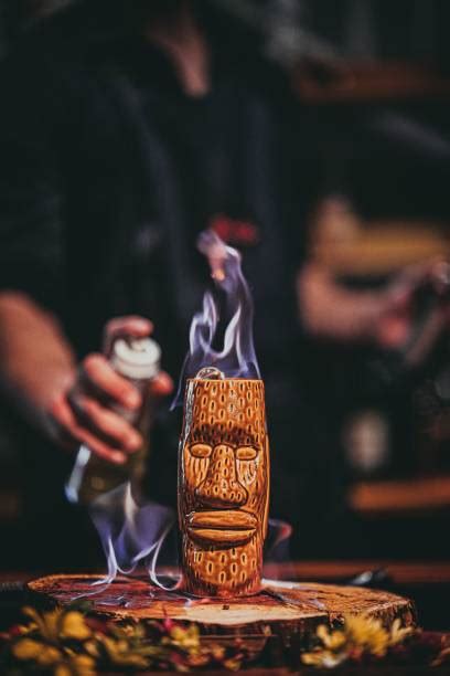 30 Tiki Drink In Hand Stock Photos Pictures And Royalty Free Images