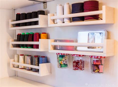 The Shelves Are Filled With Different Types Of Thread