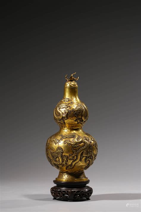 Bidlive A Chinese Gilt Bronze Nine Dragons Double Gourd Vase And Stand