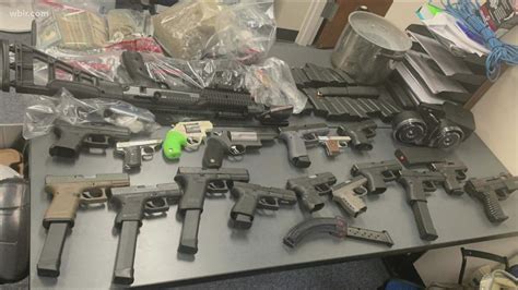 Chicago Man Charged After Police Find 20 Guns And Several Drugs In