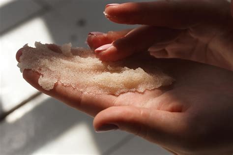 Premium Photo Oil Salt Scrub Cosmetic Surgery Hand Peeling Massage Of