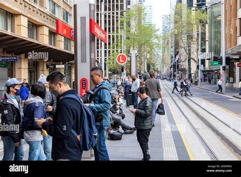 Sydney CBD light rail network, commuters wait on Bridge street station ...