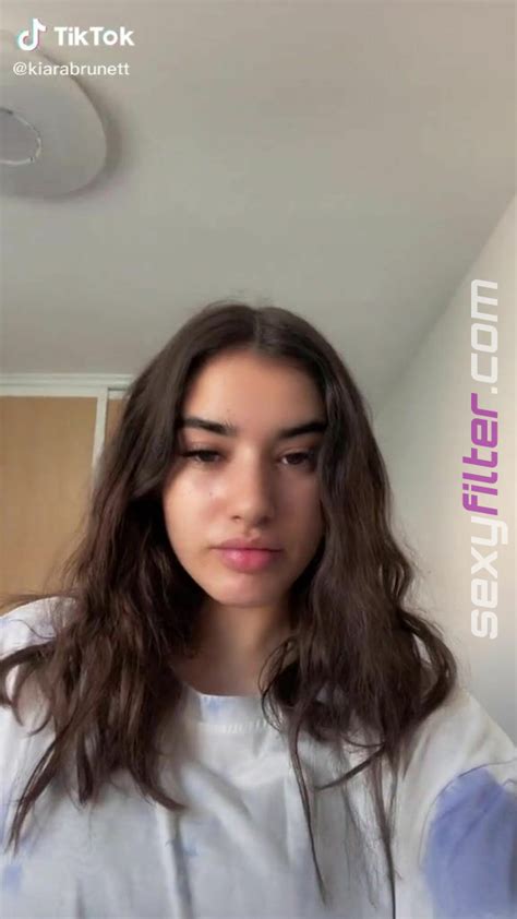 Alluring Kiara Brunett Shows Cleavage In Erotic Black Bikini Top Sexyfilter