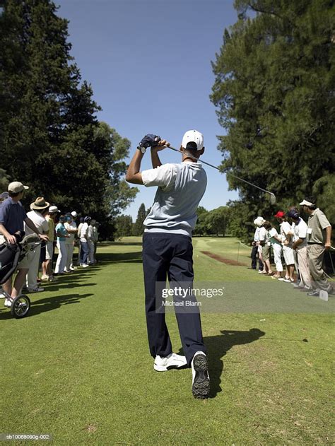 Spectators And Male Golfer On Course High Res Stock Photo Getty Images