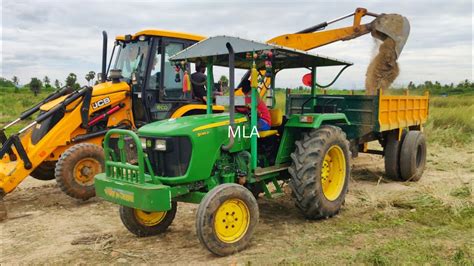 John Deere Di Power Plus Tractor With Fully Loaded Trolley Pulling