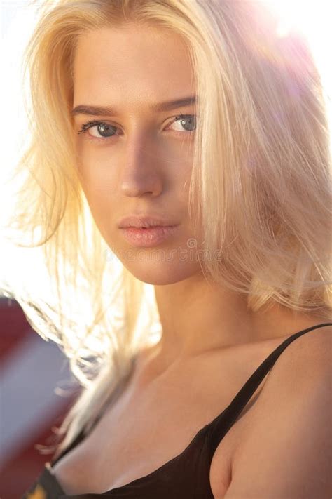 Tender Blonde Blue Eyed Model With Natural Makeup And Hair Look Stock