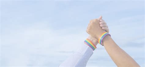 Gay Pride Concept Gay Couple Holding Hands With Lgbt Pride People Thrust