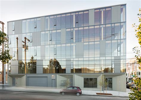 Glass Facade Reveals Timber Structure Of Portland Office Building