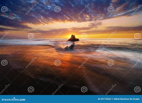 Rock In Sopelana Beach At Sunset Stock Image Image Of Waves Water