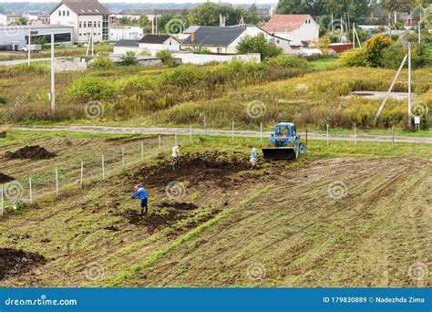 Fertilizing Fields Blue Tractor Fertilizing A Field Farmers Spreading