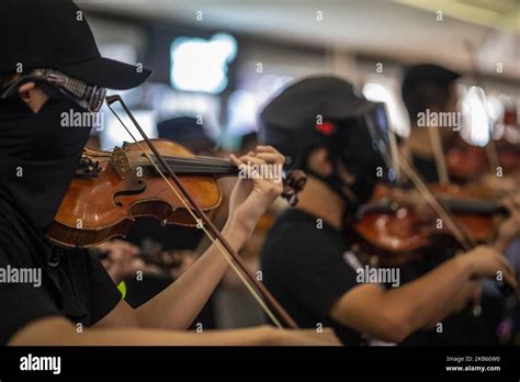 A Protester Is Seen Playing A Violin Inside A Shopping Mall In Hong Kong On September 18 2019