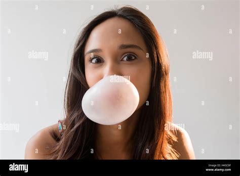 Blowing bubble gum hi-res stock photography and images - Alamy