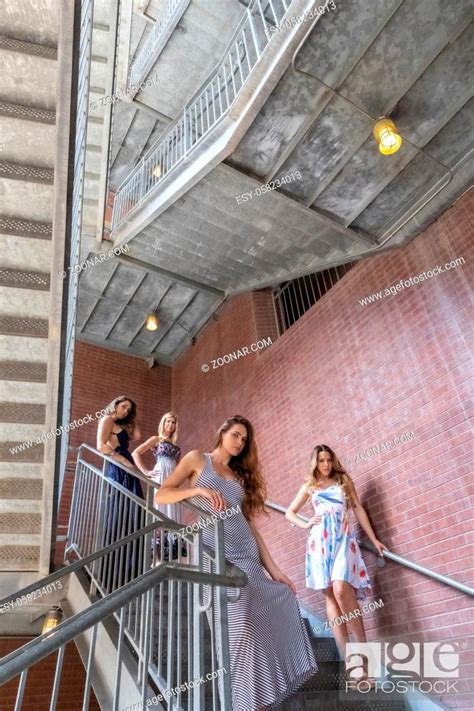 A Beautiful Brunette Model Posing Outdoors In An Urban Environment Stock Photo Picture And Low