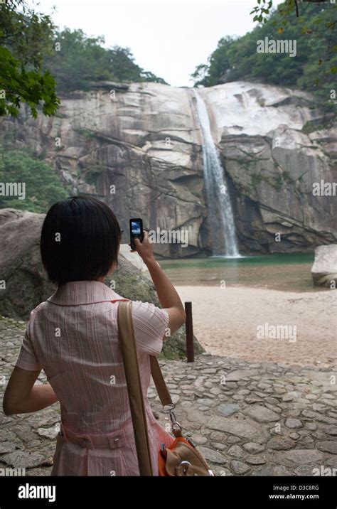 North Korean Woman Taking Picture Of Kaesong Waterfall Kaesong North