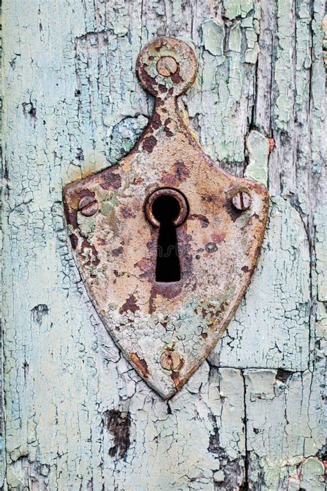 Old Rustic Lock And Keyhole On A Vintage Wooden Door Stock Image