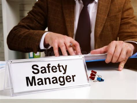 Safety Manager Works With Instructions Of Osha Occupational Safety And